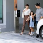 progressive young parents daughter living home with electric car ()