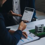real estate agent talked about terms home purchase agreement asked customer sign documents make contract legally home sales home insurance concept