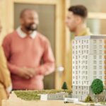 architecture team meeting city model office construction agency development strategy business people architect teamwork d prototype buildings property mock up space